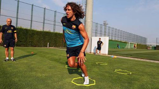 Puyol tập luyện trở lại sau 2 tháng