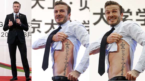 Becks cởi áo khoe hình xăm trước hàng ngàn người